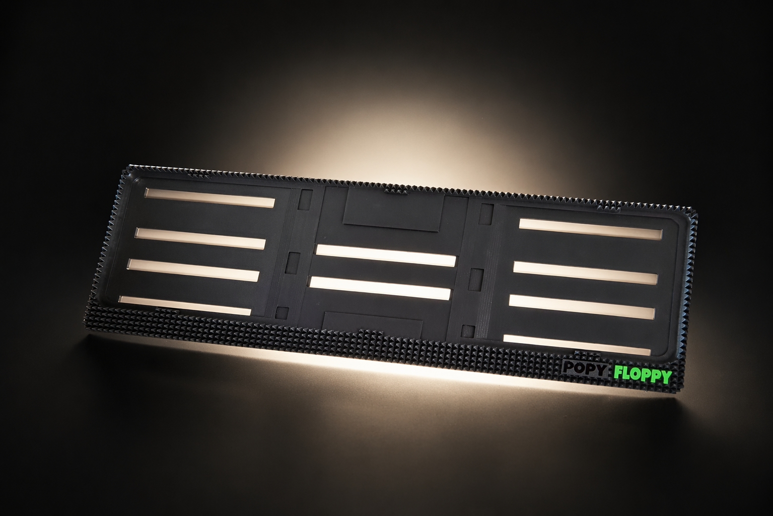 Pyramid plate underlay — front product shot showing raised pyramidal texture border